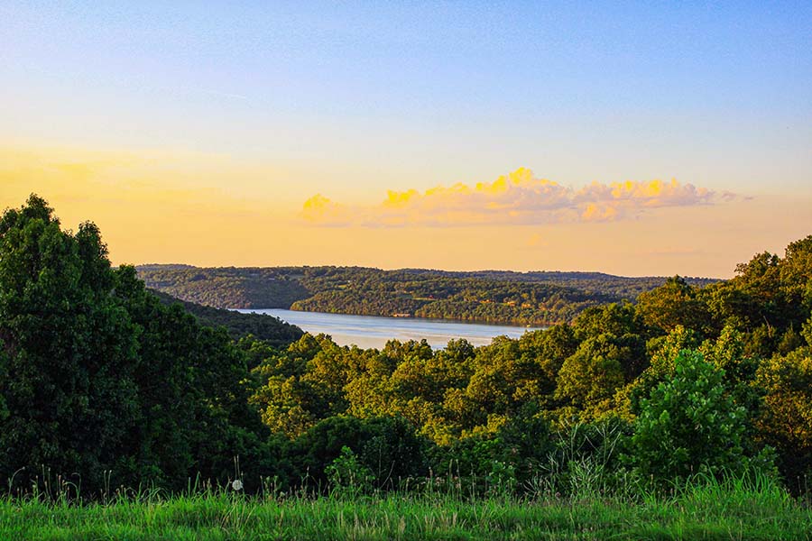 Mountain Home AR - View of Lake and Surrounding Mountains at Sunset in Mountain Home Arkansas